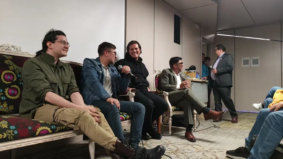 Panel reacting with laughter after an answer.